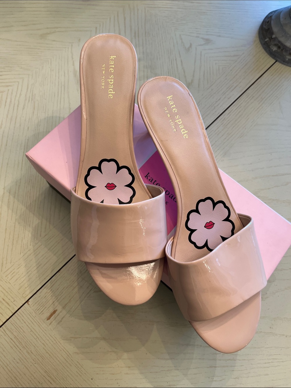 kate spade glossy blush pink patent slide mules .  Heel is 2 1/2” high